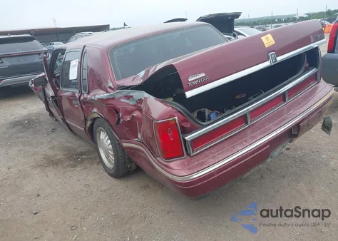 1996 Lincoln Town Car Cartier z USA, uszkodzony, nr VIN 1LNLM83W4TY622456